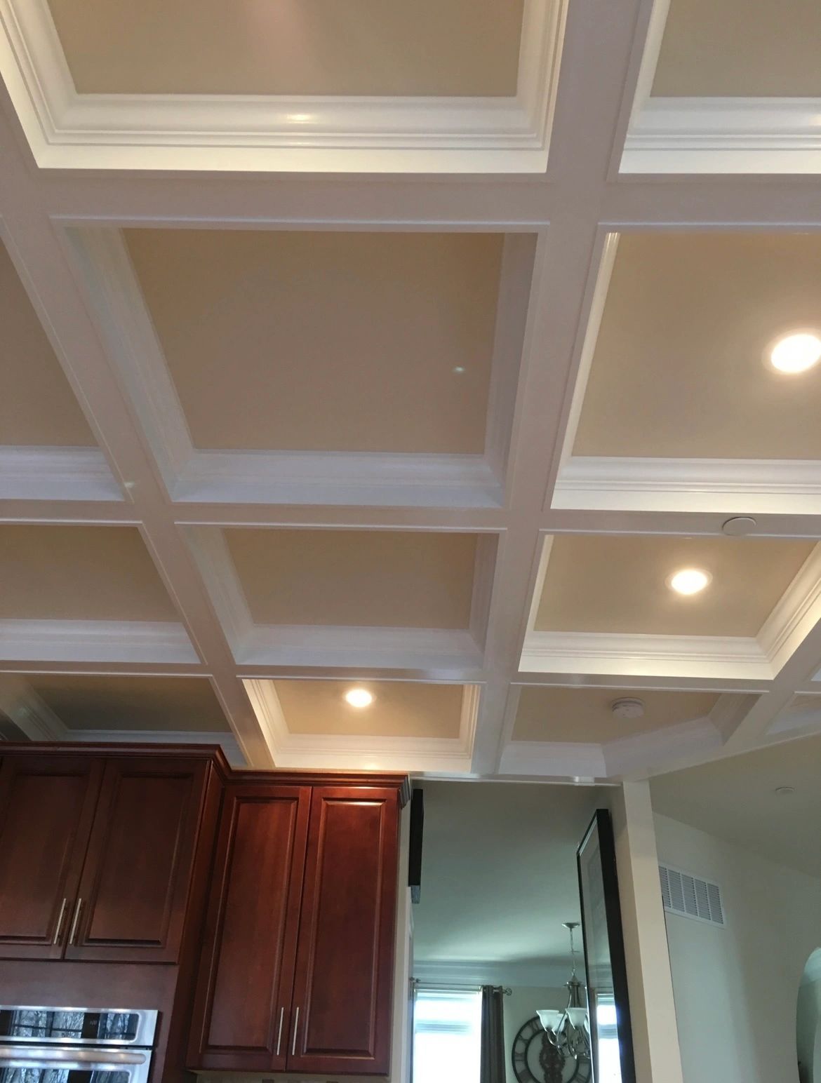 Coffered ceiling. A full coffered grid with recessed lighting.