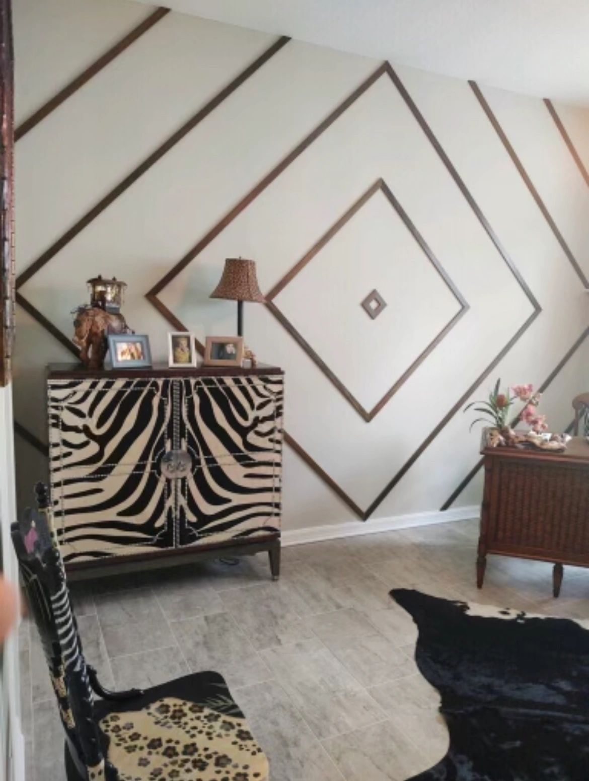 Nested diamond wall. Dark trim nested diamonds on a white wall.