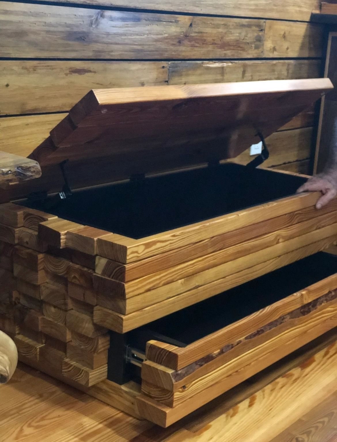 Stacked-timber chest. A chest built like a log pile, with a drawer hidden in the stack.