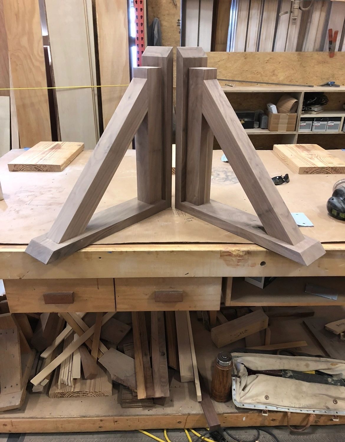 A-frame legs, dry fit. Walnut legs dry-fit on the bench before glue-up.
