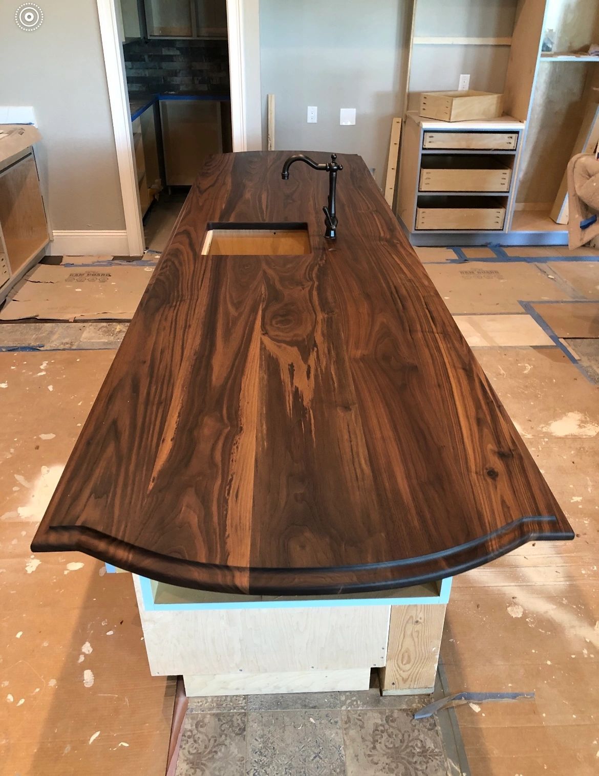 Island top, install day. A walnut island with a profiled edge going in.